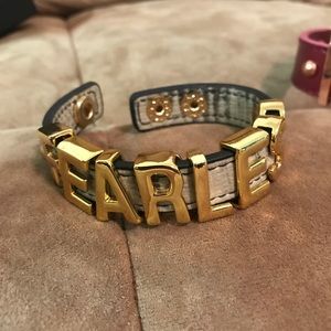 BCBG inspiration quote faux leather snap bracelet